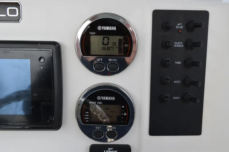Slide: The Image of Control panel of 2018 Robalo R200 Center Console with Yamaha gauges and switches. - 37