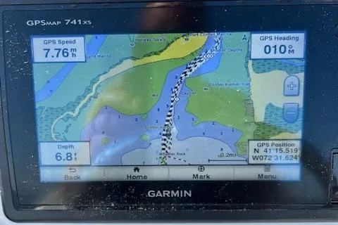 Slide: The Image of Garmin GPS display on 2018 Robalo R200 Center Console, showing speed, heading, and depth. - 40