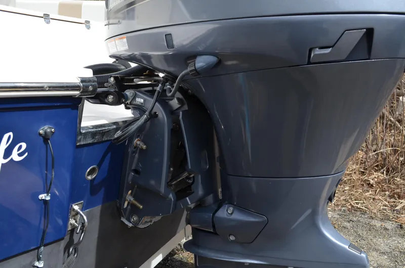 Slide: The Image of 2018 Robalo R200 Center Console boat with outboard motor detail. - 42