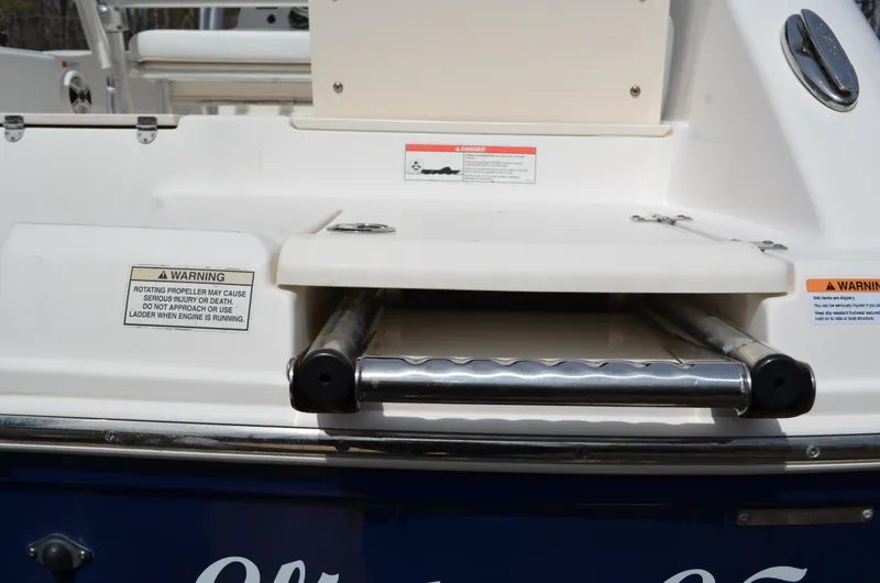 Slide: The Image of 2018 Robalo R200 Center Console boat with retractable swim ladder. - 45