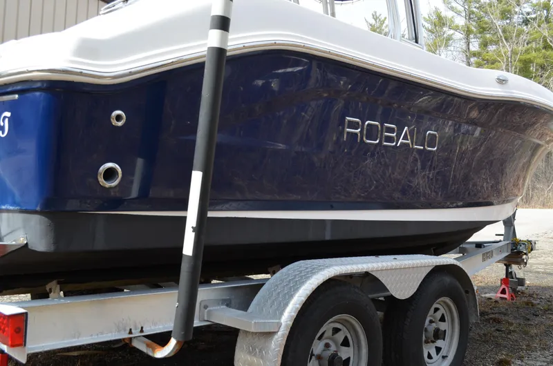 Slide: The Image of 2018 Robalo R200 Center Console boat on trailer, side view. - 46