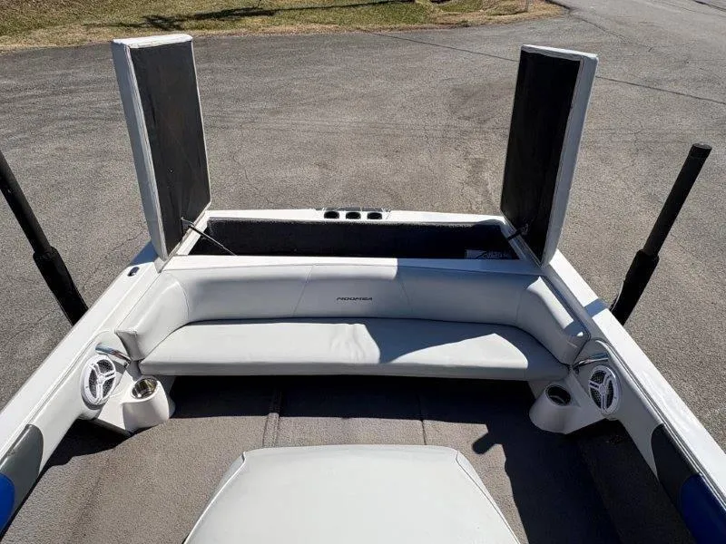 Slide: The Image of 2009 Moomba Outback SK boat interior with seating and storage compartments. - 23