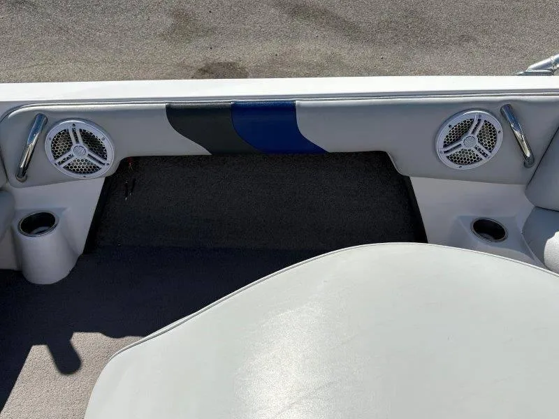 Slide: The Image of 2009 Moomba Outback SK interior with speakers and cup holders. - 24