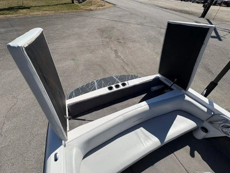 Slide: The Image of 2009 Moomba Outback SK boat interior with open storage compartments. - 25