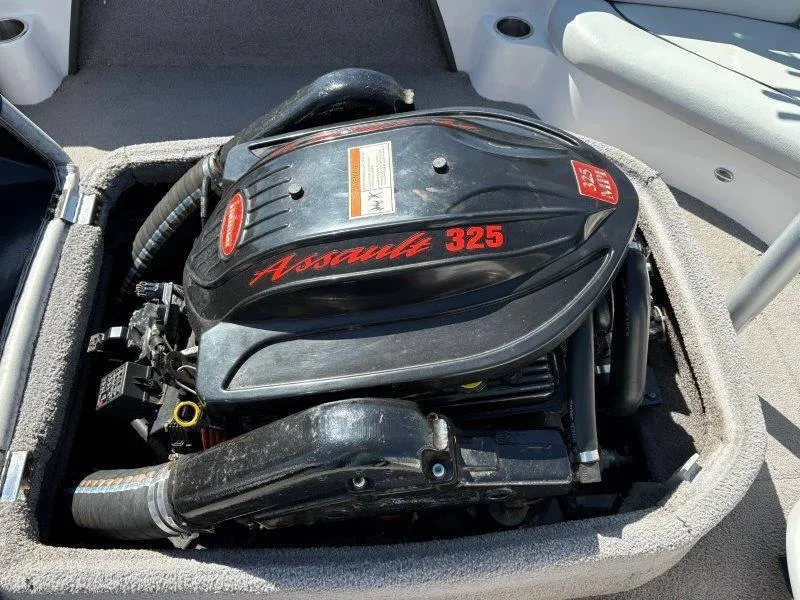 Slide: The Image of 2009 Moomba Outback SK boat engine, Assault 325 model, in open compartment. - 39