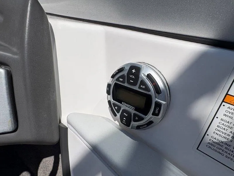 Slide: The Image of Kenwood audio control panel in 2009 Moomba Outback SK boat interior. - 41