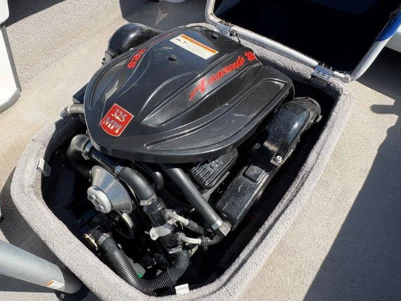 Slide: The Image of 2009 Moomba Outback SK engine, 325 HP Assault model, in open compartment. - 49