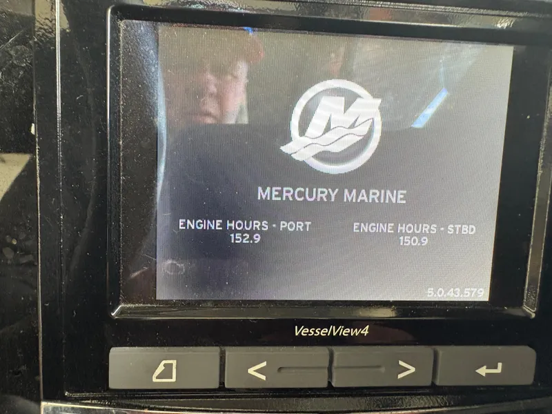 Slide: The Image of Mercury Marine VesselView4 display showing engine hours for Sea Ray SLX 310, 2017 model. - 16
