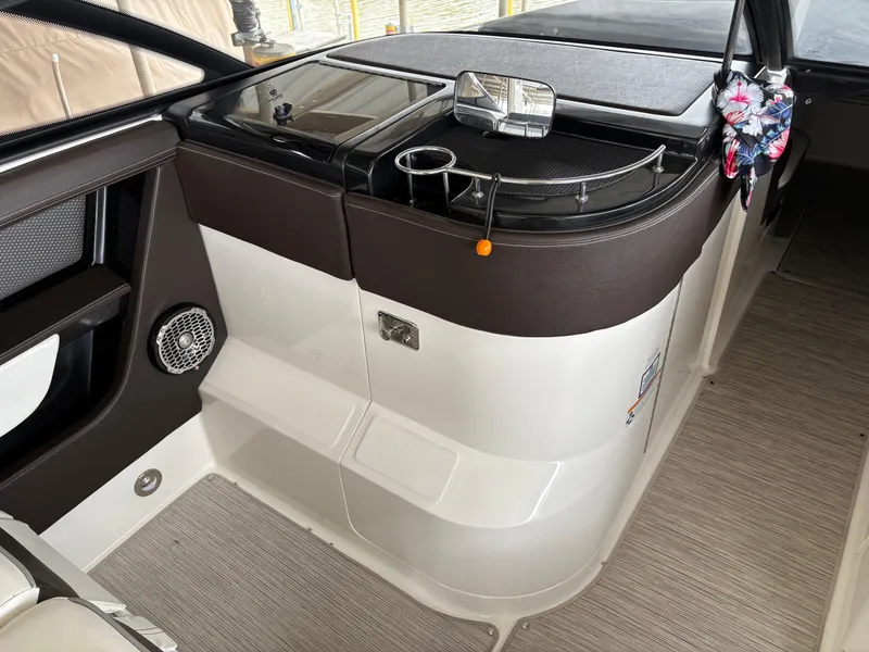 Slide: The Image of 2017 Sea Ray SLX 310 interior with sleek design and modern amenities. - 26