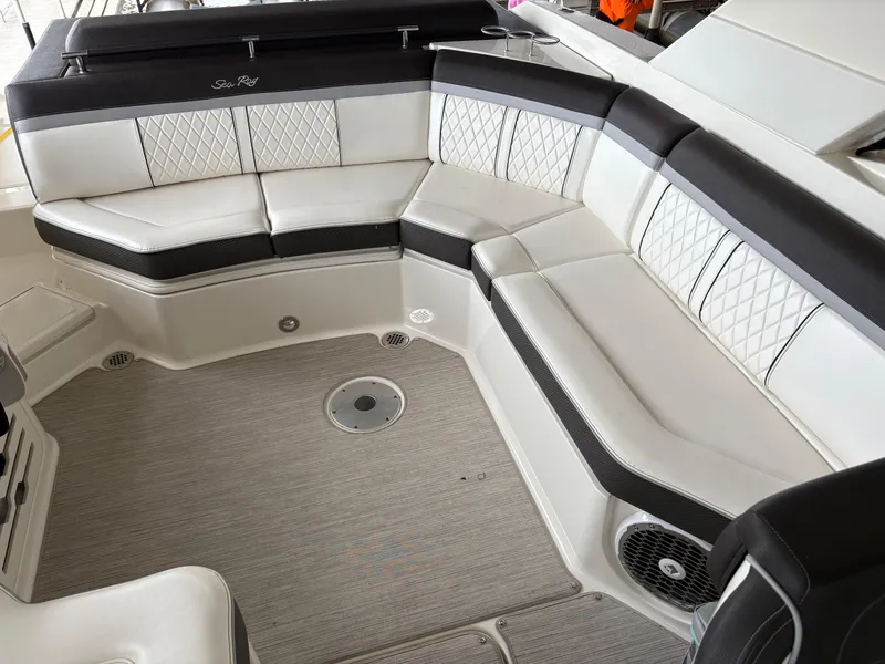 Slide: The Image of Luxurious seating area on a 2017 Sea Ray SLX 310 boat with elegant upholstery. - 29