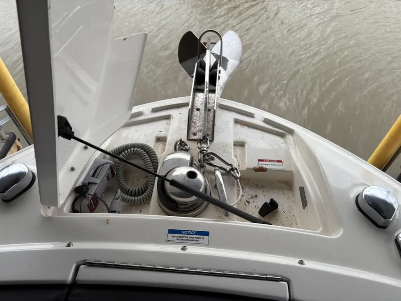 Slide: The Image of 2017 Sea Ray SLX 310 boat anchor system and storage compartment. - 6