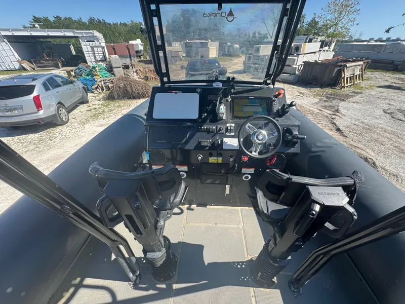 Slide: The Image of Cockpit of 2020 Custom Sea Legs Hydrasol Amphibious RIB 30 with steering wheel and controls. - 25