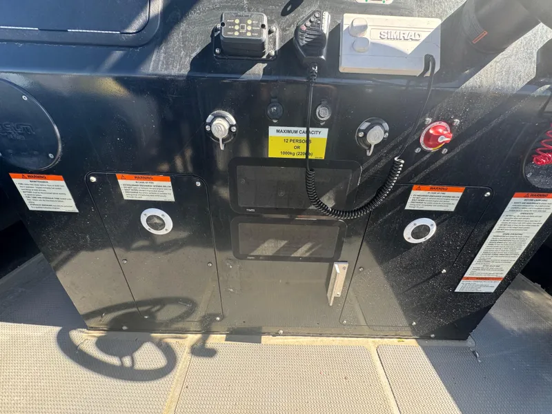 Slide: The Image of Control panel of 2020 Sea Legs Hydrasol Amphibious RIB 30 with steering wheel and instruments. - 29