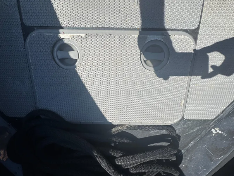 Slide: The Image of Deck of 2020 Sea Legs Hydrasol Amphibious RIB 30 with rope and hatch covers. - 32