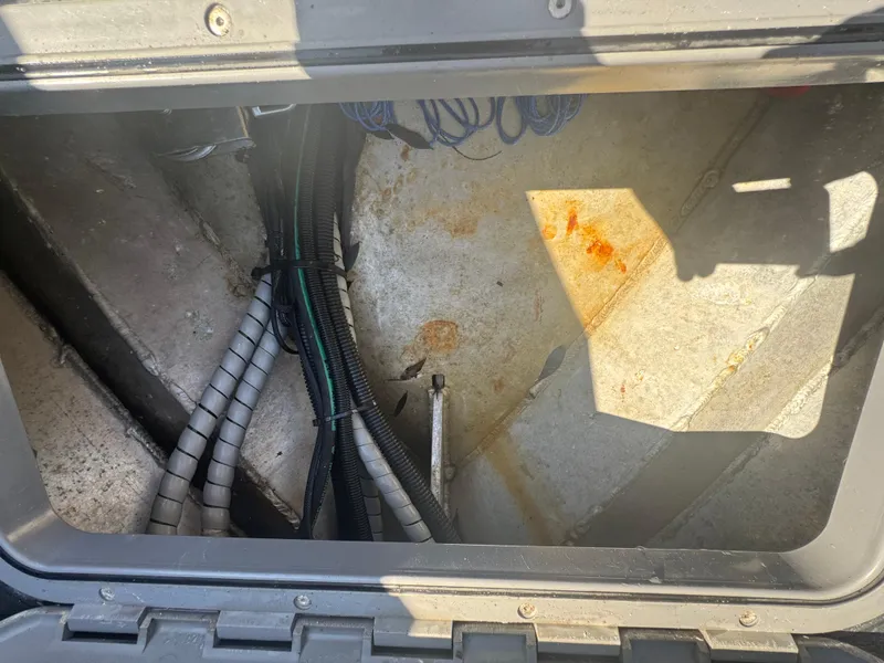 Slide: The Image of Interior view of a 2020 Sea Legs Hydrasol Amphibious RIB 30, showing cables and storage area. - 33