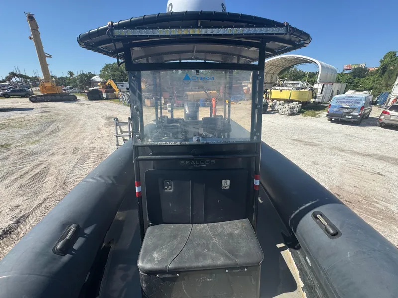 Slide: The Image of 2020 Sea Legs Hydrasol Amphibious RIB 30, parked on land, showcasing cockpit and controls. - 38