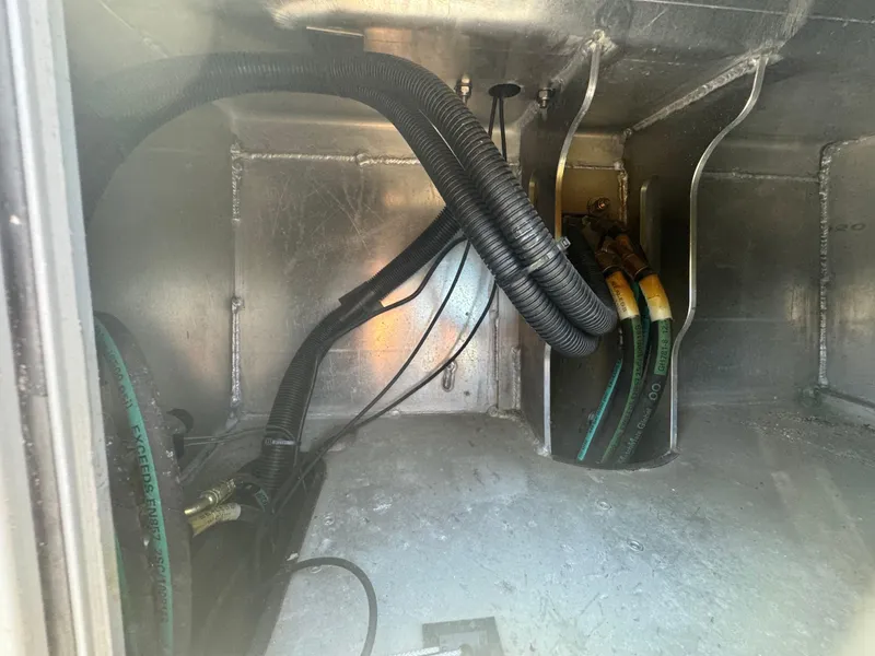 Slide: The Image of Interior view of 2020 Sea Legs Hydrasol Amphibious RIB 30, showcasing wiring and hoses. - 46