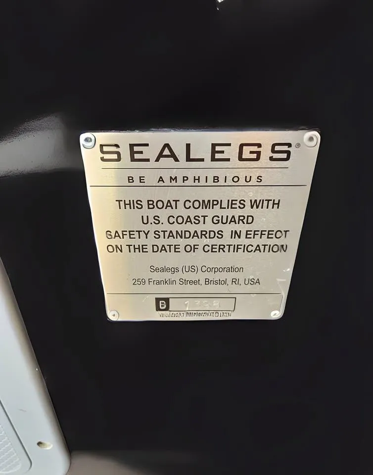 Slide: The Image of Plaque on Sea Legs Hydrasol Amphibious RIB 30, 2020, showing U.S. Coast Guard compliance. - 5