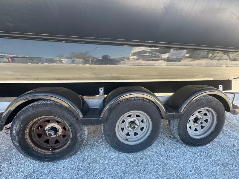 Slide: The Image of Trailer wheels of a 2020 Sea Legs Hydrasol Amphibious RIB 30 on gravel. - 8