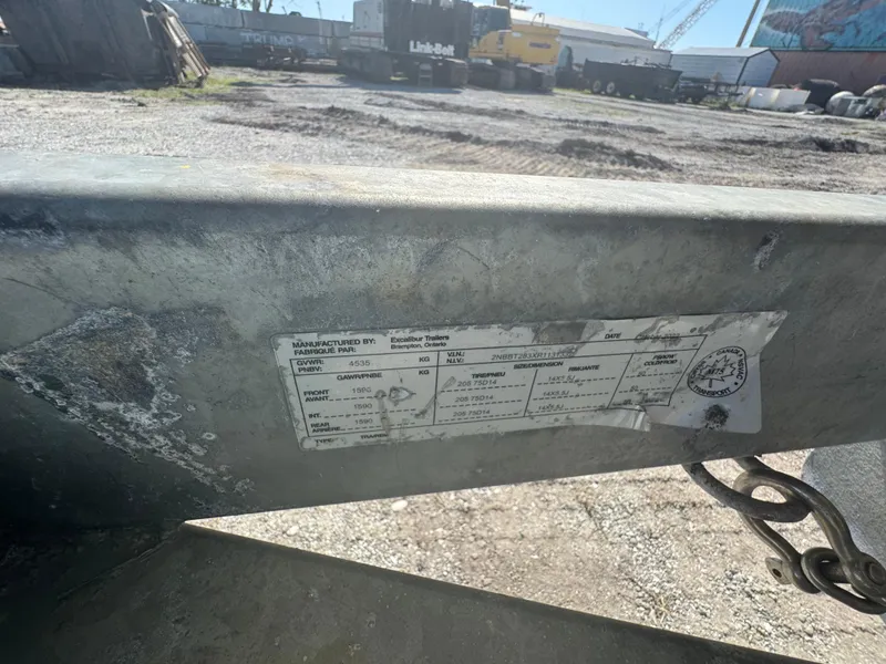 Slide: The Image of Label on a Custom Sea Legs Hydrasol Amphibious RIB 30, 2020 model, in an industrial yard. - 9