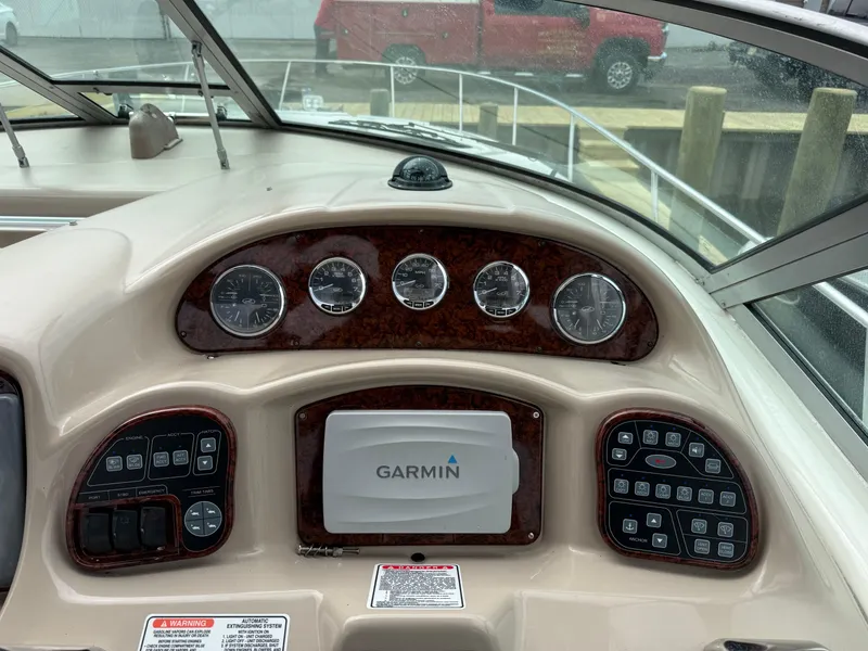 Slide: The Image of Dashboard of 2005 Sea Ray 340 Sundancer with Garmin navigation system. - 25