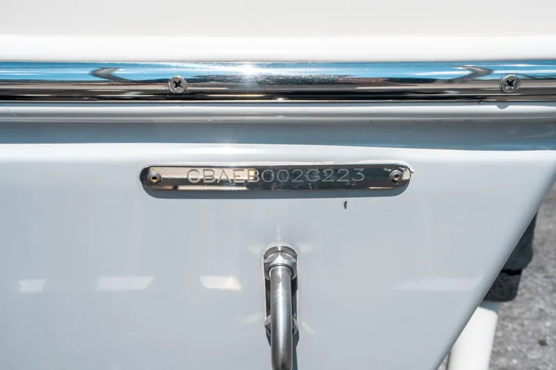 Slide: The Image of 2023 Cobia 240 CC boat hull identification number plate. - 40