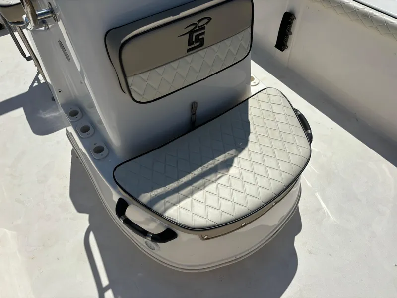 Slide: The Image of 2021 Carolina Skiff 21 LS boat seat with diamond-patterned upholstery. - 32