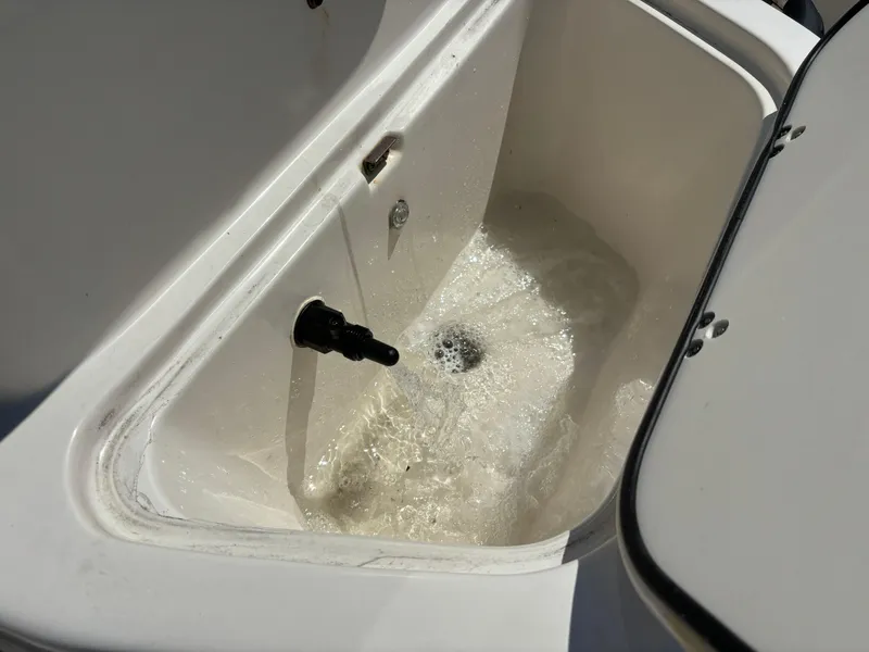 Slide: The Image of Livewell in 2021 Carolina Skiff 21 LS boat, filled with water. - 34
