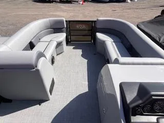 Slide: The Image of 2025 Bentley Pontoons 220 Cruise XL interior with spacious seating and modern design. - 2