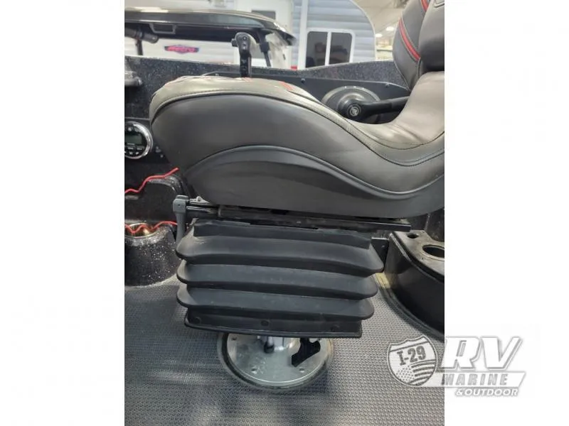 Slide: The Image of 2022 Nitro ZV20 boat seat with adjustable suspension system in a showroom. - 13