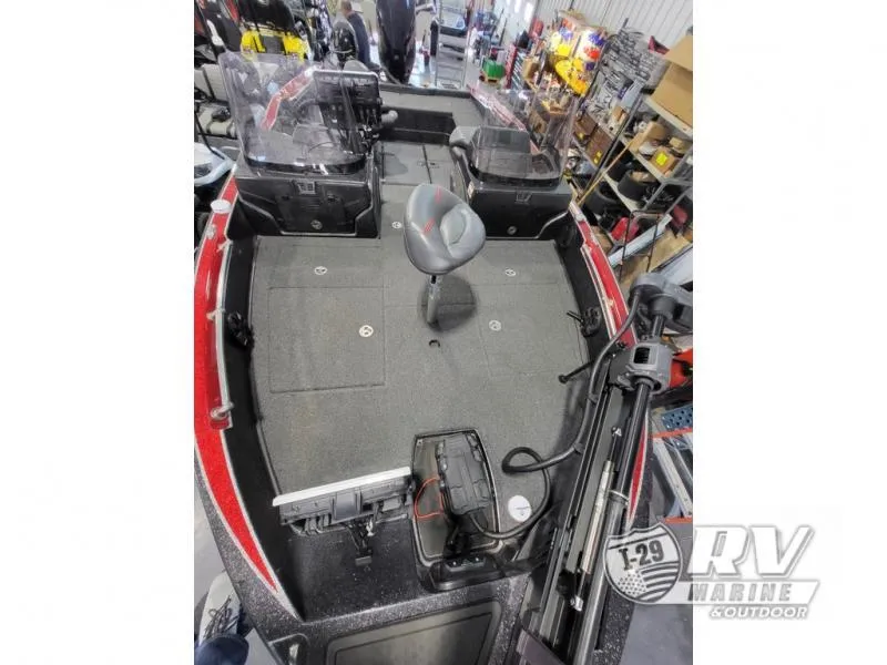 Slide: The Image of 2022 Nitro ZV20 boat interior with seating and equipment in a showroom. - 6