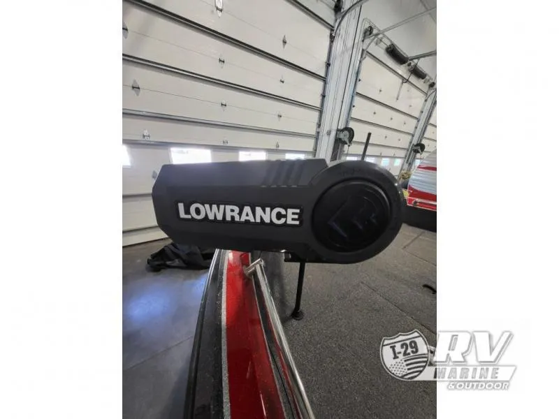 Slide: The Image of Lowrance device on 2022 Nitro ZV20 boat in garage setting. - 8