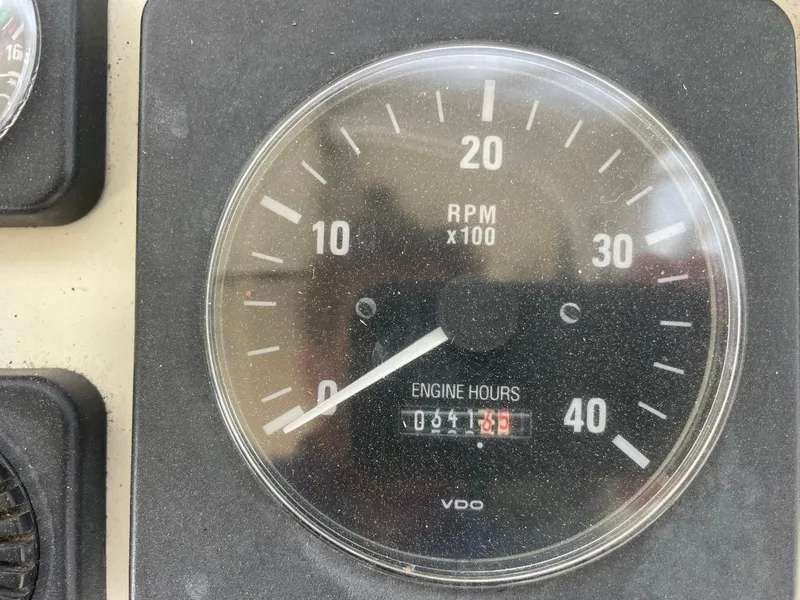 Slide: The Image of Close-up of a 2003 Carolina Classic 28 engine hour meter showing 861.3 hours. - 9