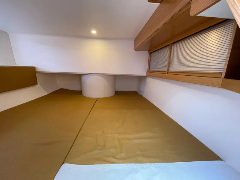 Slide: The Image of Interior cabin of 2021 Dragonfly 32 Evolution sailboat with cozy sleeping area. - 19