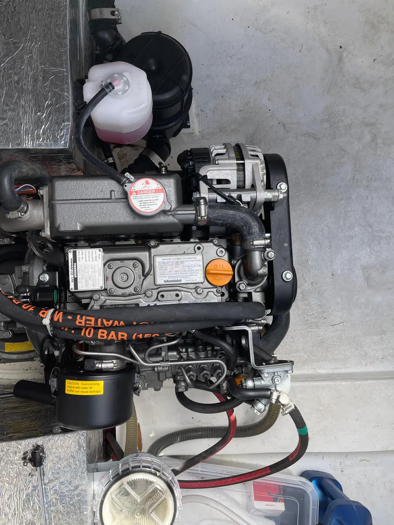 Slide: The Image of 2021 Dragonfly 32 Evolution engine, detailed view, showcasing components and layout. - 24