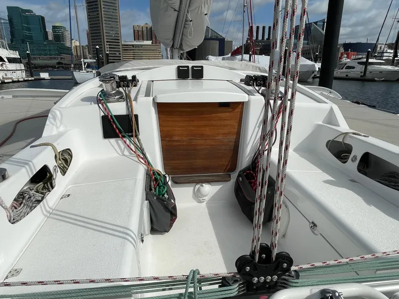 Slide: The Image of Cockpit of 2021 Dragonfly 32 Evolution sailboat docked in a marina. - 8