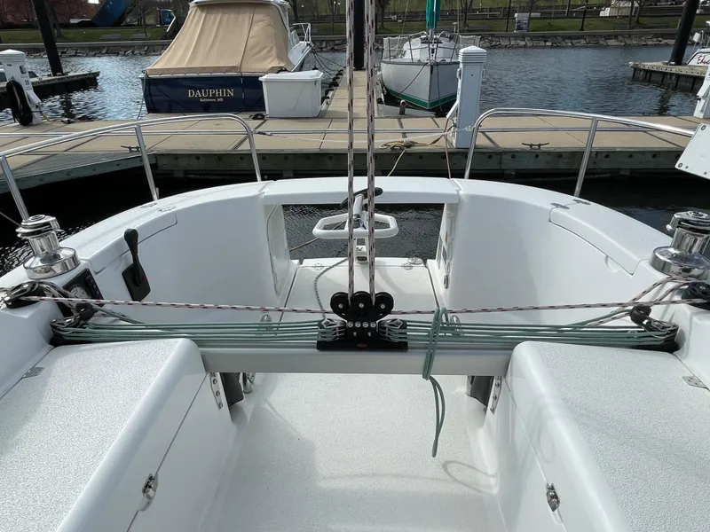 Slide: The Image of Cockpit view of 2021 Dragonfly 32 Evolution sailboat docked at marina. - 9