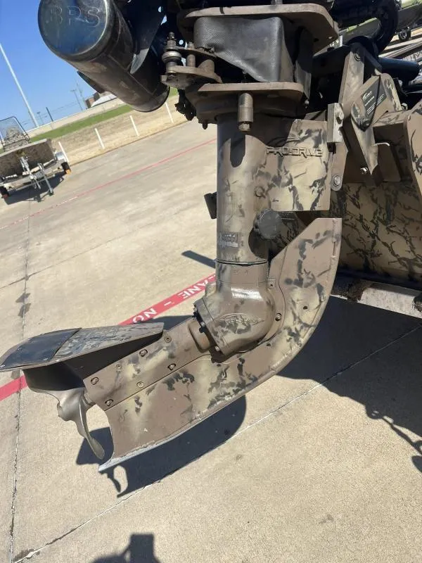 Slide: The Image of Close-up of a 2019 Pro-Line BTX 1848 boat motor in camouflage pattern. - 17