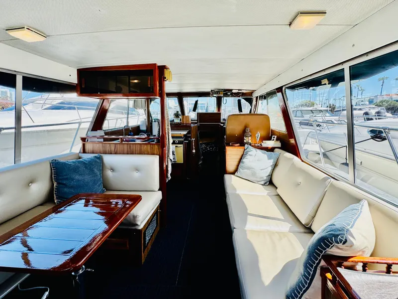 Slide: The Image of Interior of 1978 Tollycraft 30 Sedan with modern Cummins 6bt diesel motors, featuring plush seating. - 10