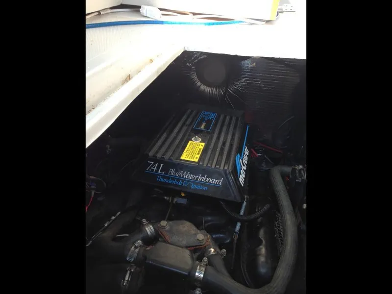 Slide: The Image of Engine compartment of 1989 Regal Commodore 360 with 7.4L MerCruiser inboard motor. - 11