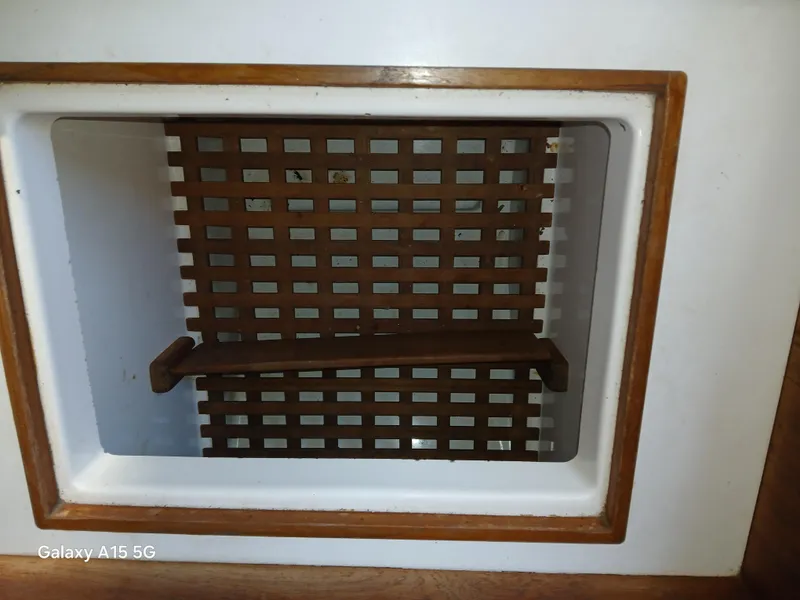 Slide: The Image of Wooden vent with lattice design in a 1981 Tartan 33 interior. - 3