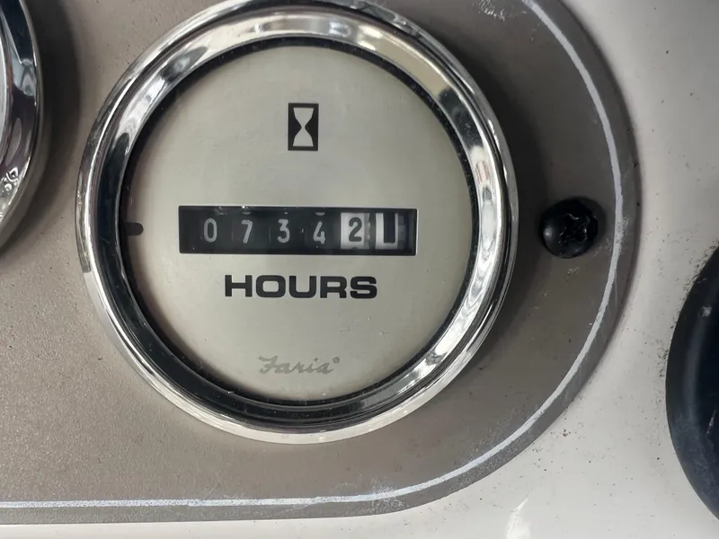 Slide: The Image of Hour meter showing 734.2 hours on 2004 Bayliner 288 Ciara Classic Command Bridge. - 35