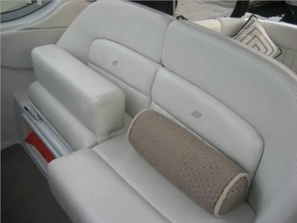 Slide: The Image of 2003 Four Winns 268 Vista boat interior with white leather seating and beige cushion. - 3