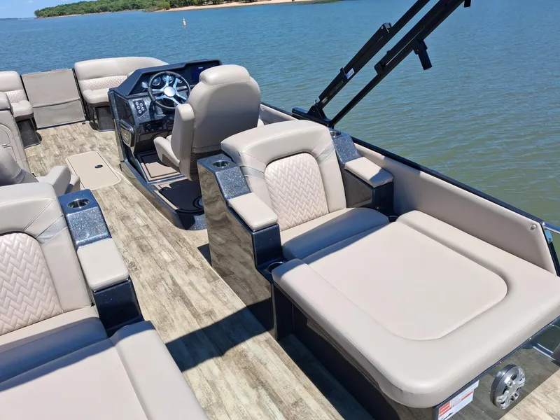 Slide: The Image of Interior of 2025 Crest Caribbean 230 SLRC on a lake. - 6