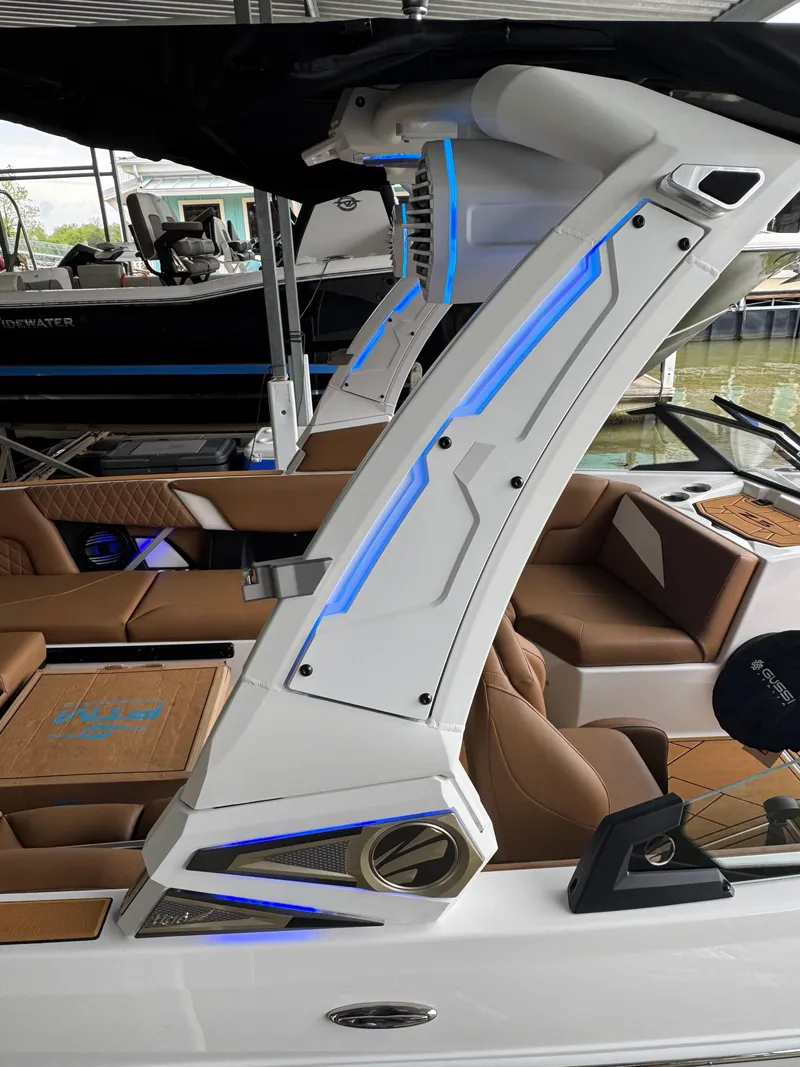 Slide: The Image of 2025 Tigé Z5 boat interior with modern design and blue LED accents. - 19