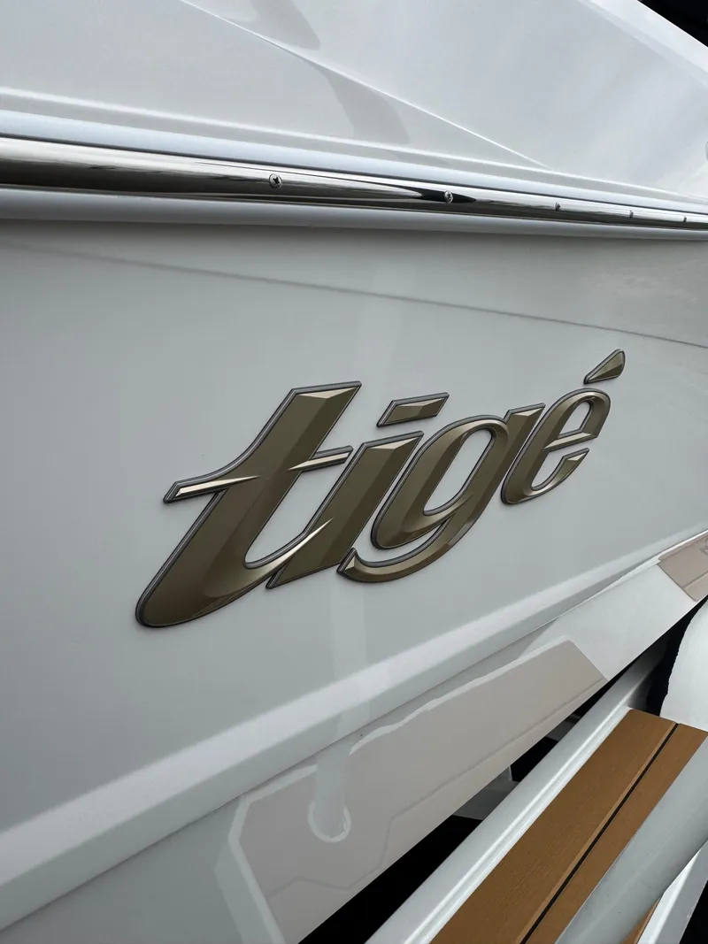 Slide: The Image of 2025 Tigé Z5 boat logo on sleek white surface. - 3