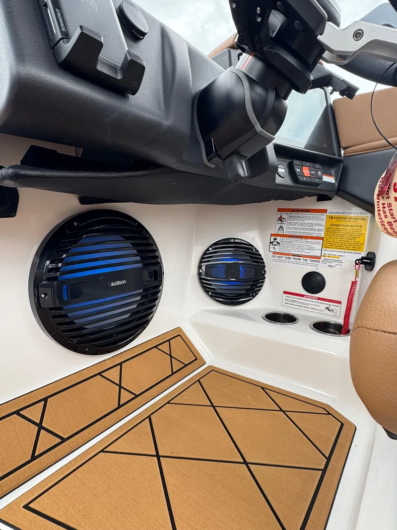 Slide: The Image of 2025 Tigé Z5 boat interior with speakers and control panel. - 9