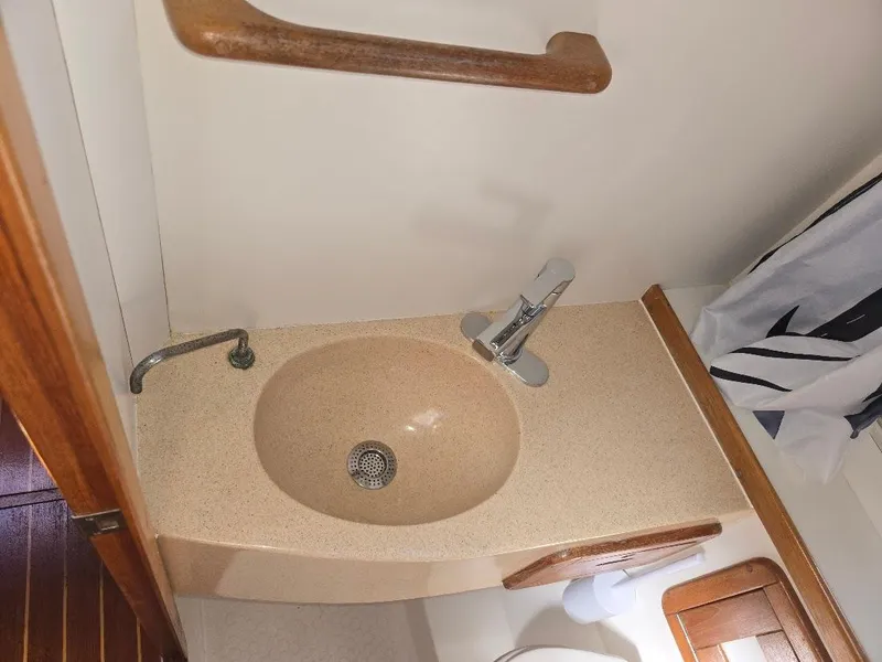 Slide: The Image of Bathroom sink area in a 1997 Catalina 42 MkII yacht. - 45