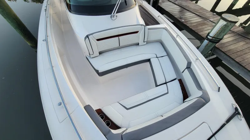 Slide: The Image of 2019 Tiara Sport 38 LS boat with luxurious seating and sleek design. - 4