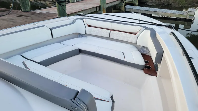 Slide: The Image of 2019 Tiara Sport 38 LS boat with spacious seating area and modern design. - 5